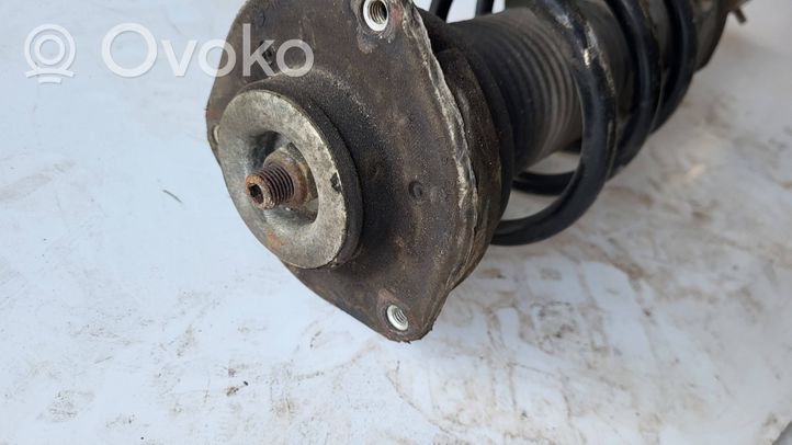 Volkswagen Eos Amortiguador delantero con muelle espiral 1T0413031DN