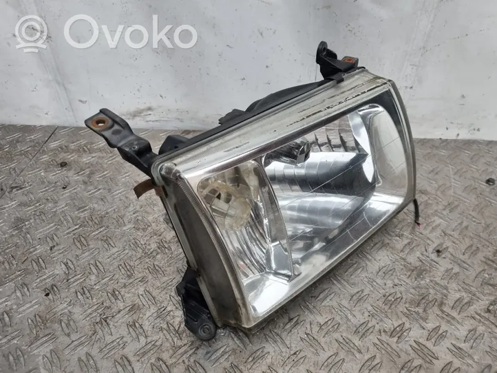 Toyota Land Cruiser (J100) Lampa przednia 6067