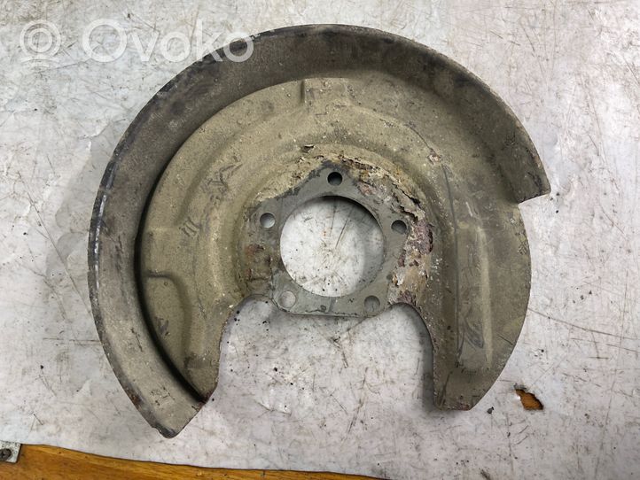 Volkswagen PASSAT B5 Rear brake disc plate dust cover 8e0615611c