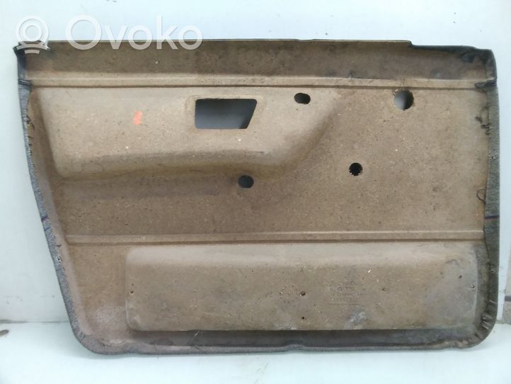 Volkswagen Golf II Rivestimento del pannello della portiera anteriore 193867012