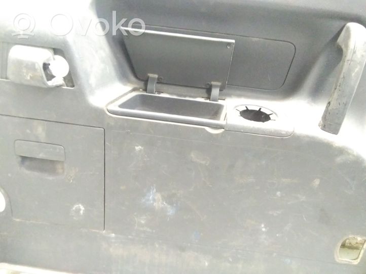 Volkswagen Touran I Trunk/boot side trim panel 