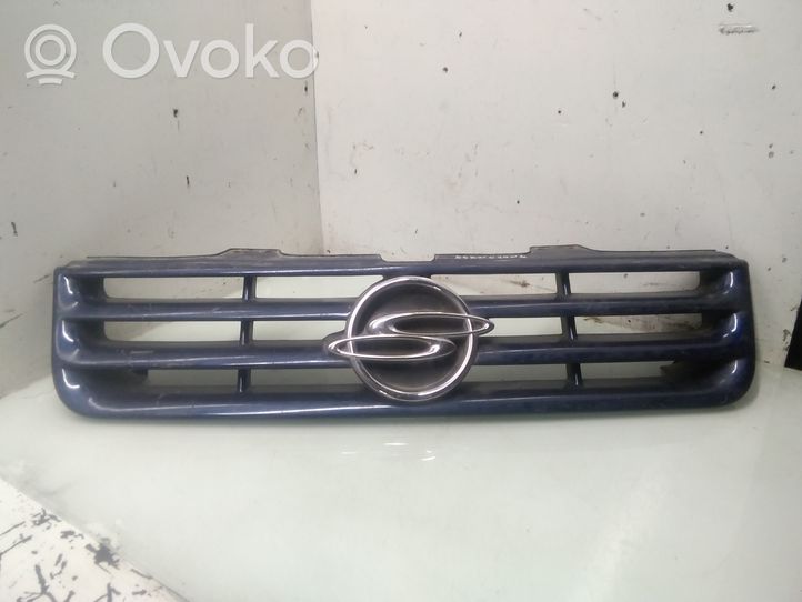 SsangYong Musso Grille calandre supérieure de pare-chocs avant 