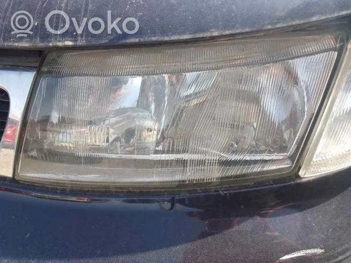 Saab 9-5 Lampa przednia 