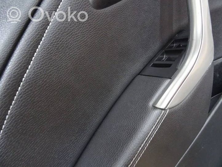Opel Astra J Boczki / Tapicerka drzwi / Komplet 