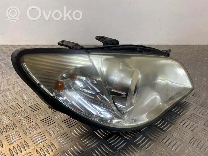 Subaru Impreza II Lampa przednia H712V55W