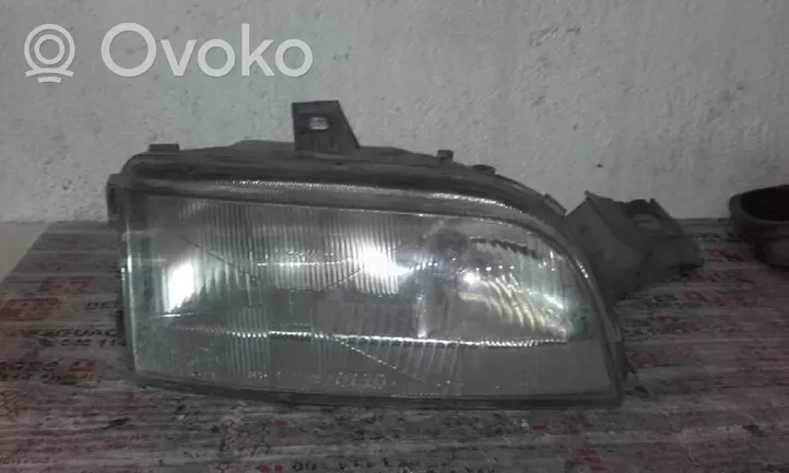 Fiat Punto (176) Phare frontale R14295600