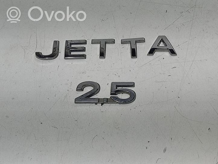 Volkswagen Jetta V Gamintojo ženkliukas/ modelio raidės 