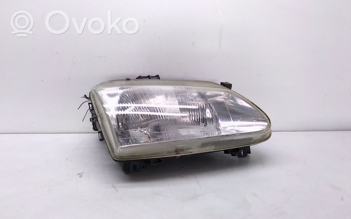 Renault Scenic I Lampa przednia 7701672735