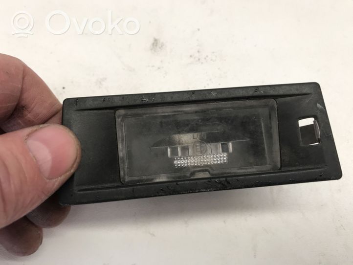 Fiat Bravo - Brava Lampa oświetlenia tylnej tablicy rejestracyjnej 7767732