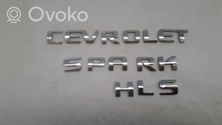 Chevrolet Spark Gamintojo ženkliukas/ modelio raidės 