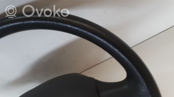 KIA Carens I Steering wheel 0K2FB57K00