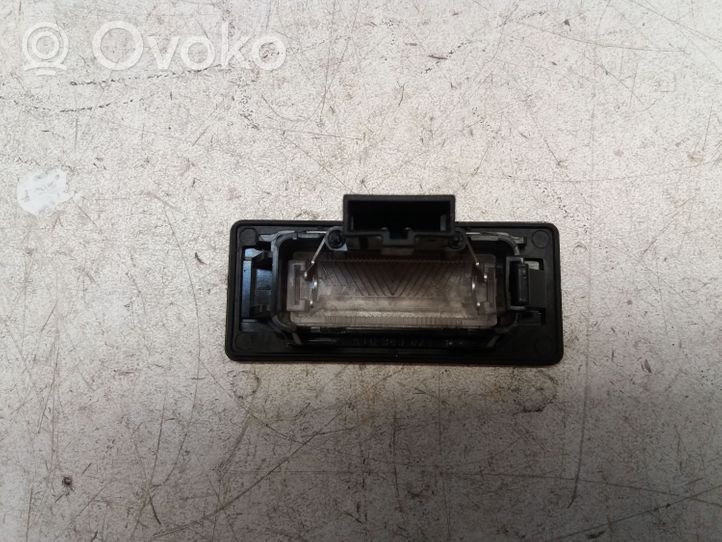 Skoda Yeti (5L) Lampa oświetlenia tylnej tablicy rejestracyjnej 8T0943021