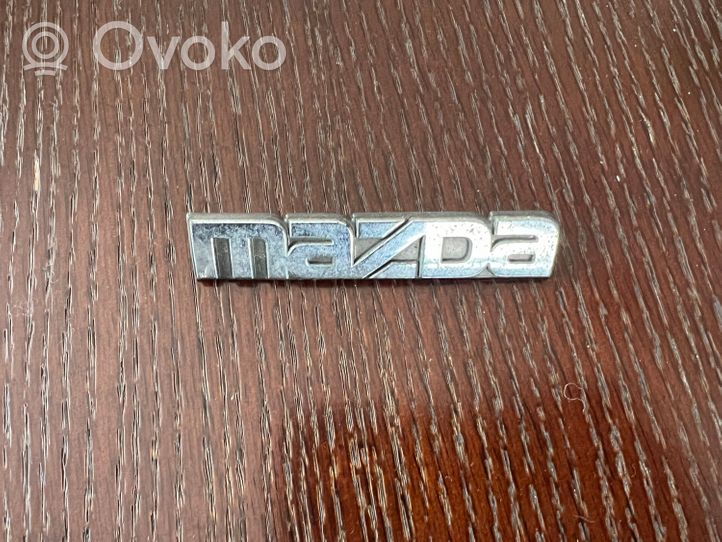 Mazda 323 Logo, emblème, badge 