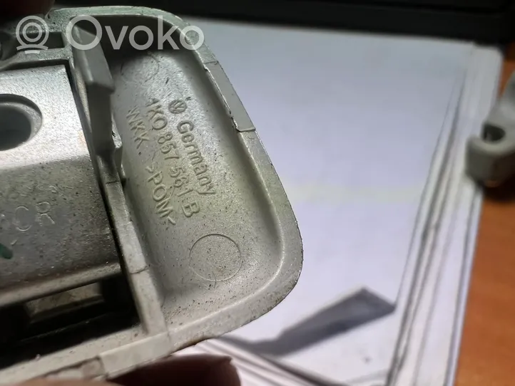Volkswagen Golf V Häikäisysuojan kiinnityskoukun kiinnike 1K0857561B
