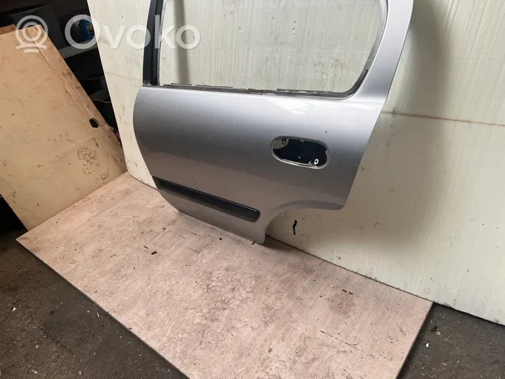 Nissan Almera N16 Rear door 