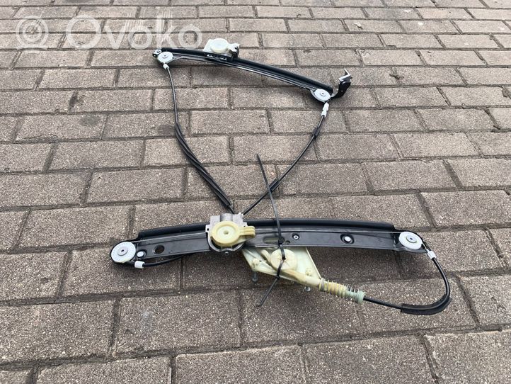 BMW 1 E82 E88 Alzacristalli elettrico della portiera anteriore 7165596