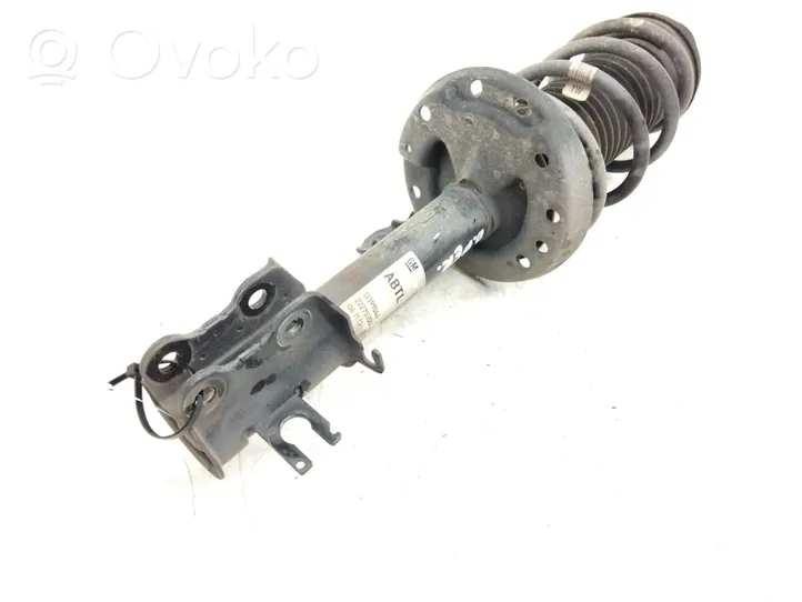 Opel Corsa D Front shock absorber with coil spring 13399044