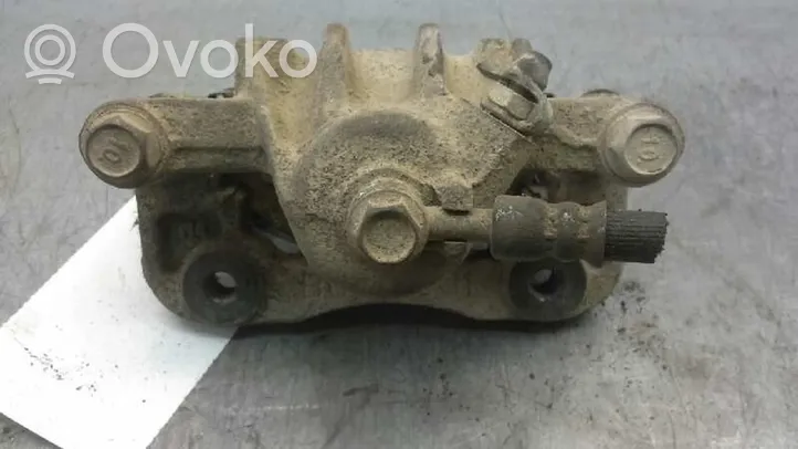 Hyundai Tucson JM Supporto della pinza del freno posteriore 583112EA00