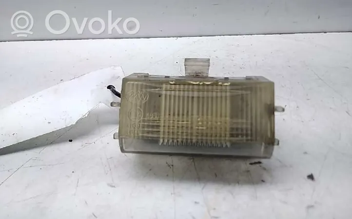 Opel Vectra A Lampa oświetlenia tylnej tablicy rejestracyjnej 1224153