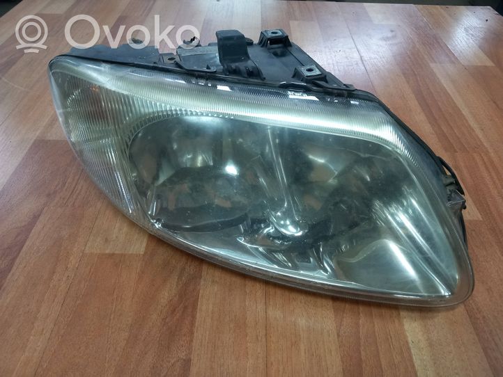 Chrysler Voyager Lampa przednia 04857710AB