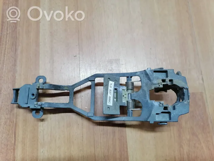 Volkswagen Touareg I Support poignée extérieur de porte avant 7L0837886C