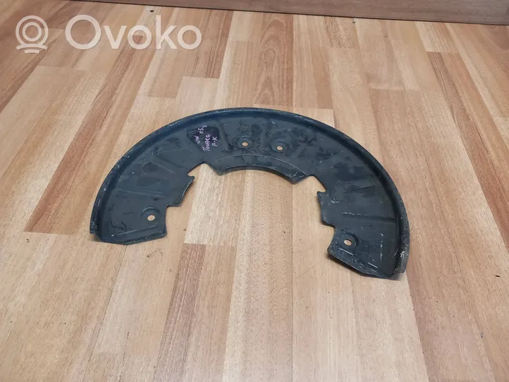 Volkswagen Touareg I Front brake disc dust cover plate 7L0615311B