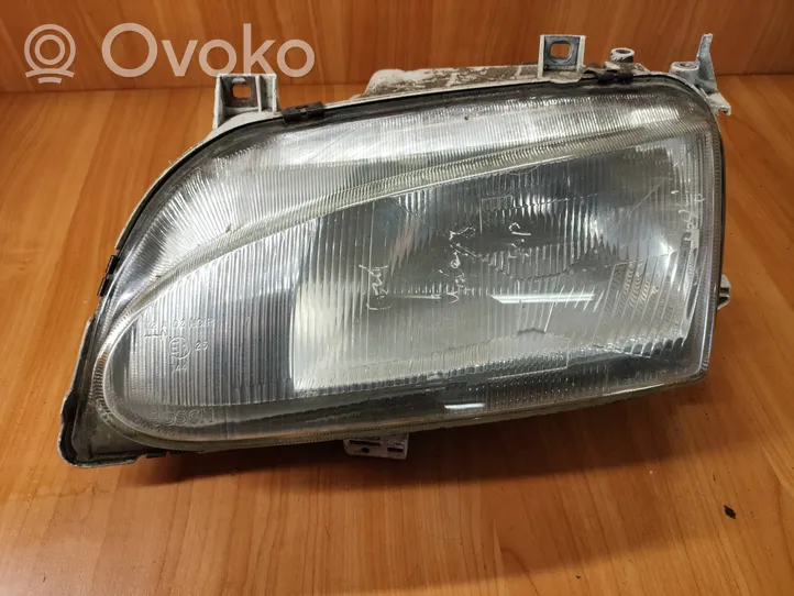 Ford Galaxy Lampa przednia 1305235254