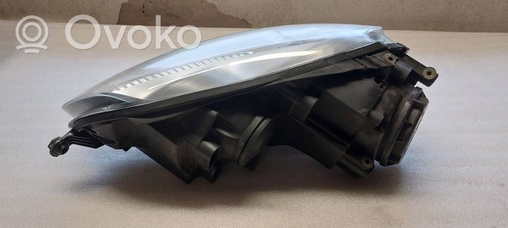 Volkswagen Golf V Lampa przednia 1K6941006AA