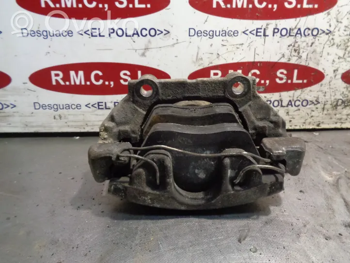 Volkswagen PASSAT Front brake caliper 