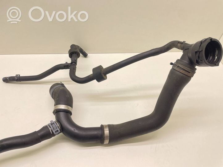 Volkswagen Touran II Engine coolant pipe/hose 1K0122101JR