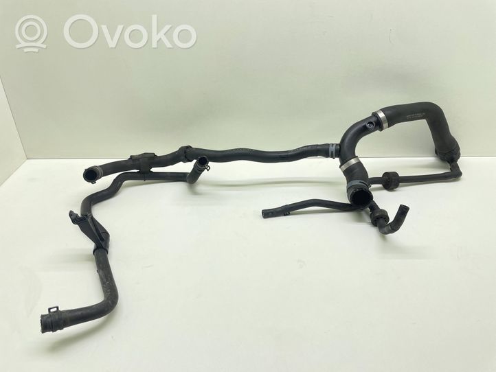 Volkswagen Touran II Engine coolant pipe/hose 1K0122101JR