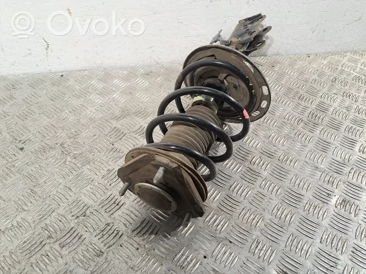 Toyota Avensis T270 Front shock absorber with coil spring 