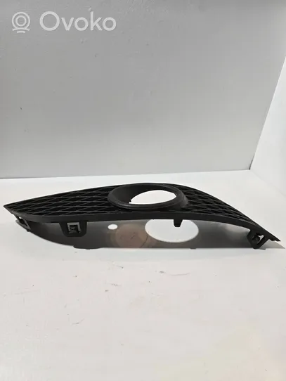 Opel Astra H Front fog light trim/grill 13225765