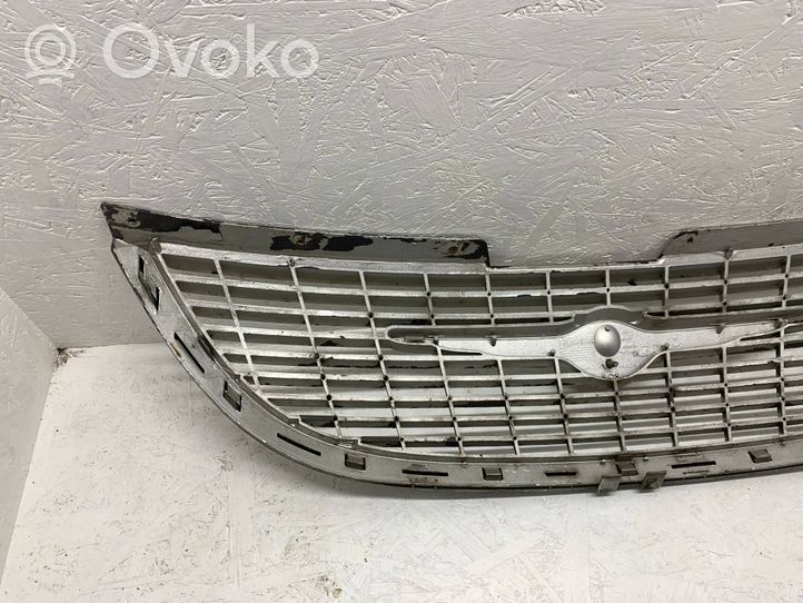 Chrysler Grand Voyager IV Grille de calandre avant 4857522AA