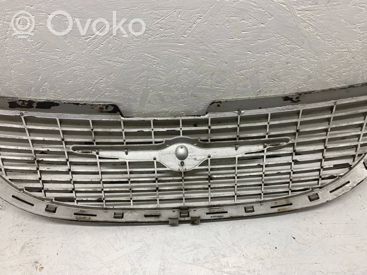 Chrysler Grand Voyager IV Grille de calandre avant 4857522AA