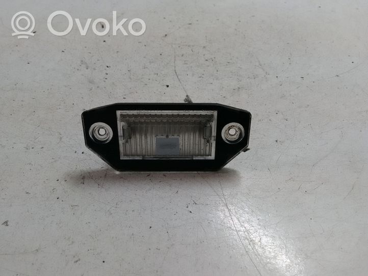 Ford Mondeo Mk III Lampa oświetlenia tylnej tablicy rejestracyjnej 1S7113550AD