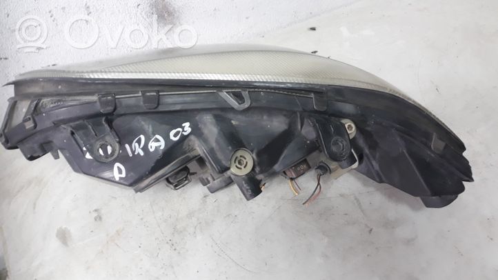 Opel Zafira A Lampa przednia 89100055