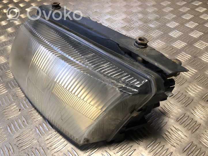 Volkswagen PASSAT B5 Lampa przednia 14869100