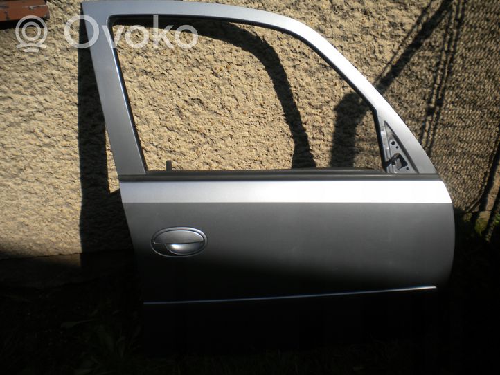 Opel Meriva A Elektryczne lusterko boczne drzwi przednich 124115