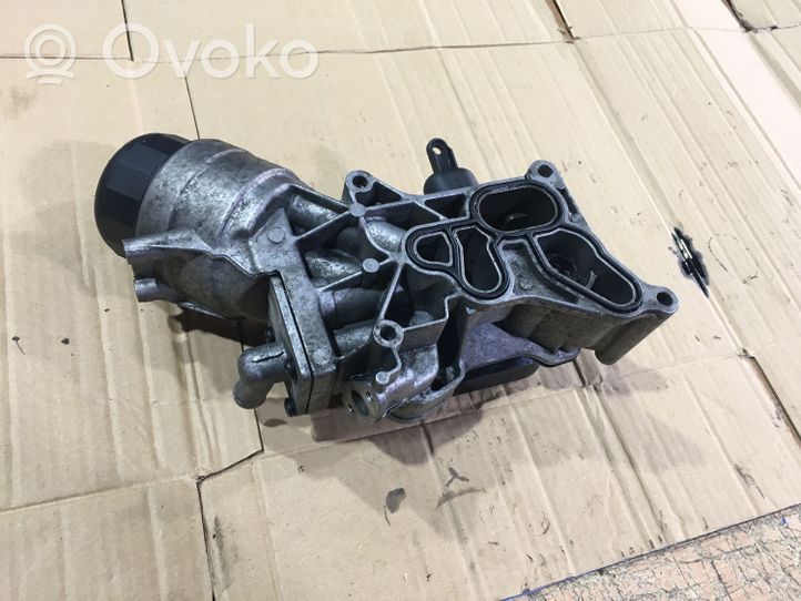 Opel Astra J Supporto di montaggio del filtro dell’olio 55238292