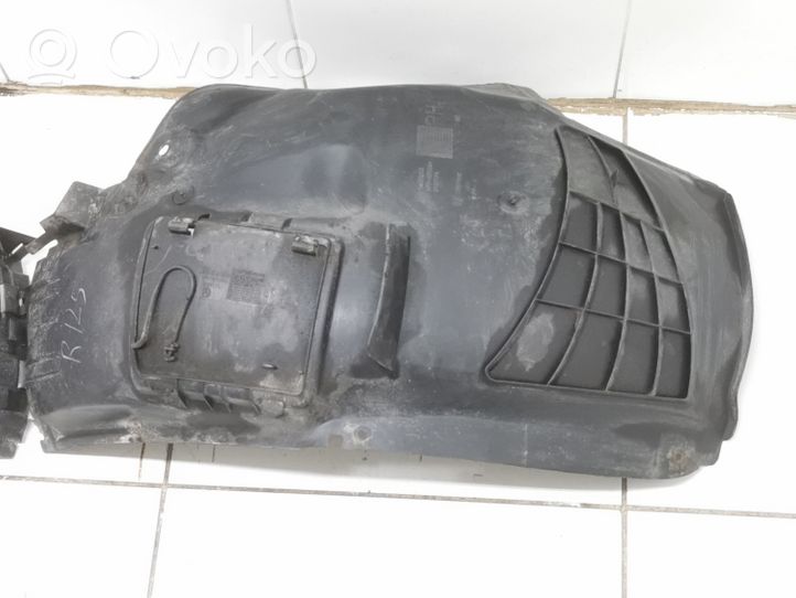 Opel Astra H Rivestimento paraspruzzi passaruota anteriore 13125605