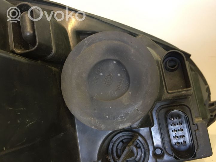 Volkswagen Golf V Lampa przednia 1K6941005Q