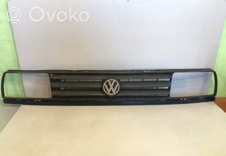 Volkswagen Jetta II Front bumper upper radiator grill 165853653E