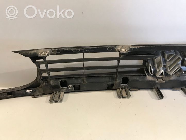 Volkswagen Golf III Front bumper upper radiator grill 1H6853653