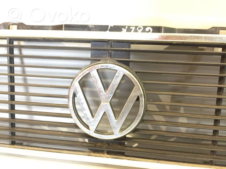 Volkswagen Golf I Grille de calandre avant 321853601