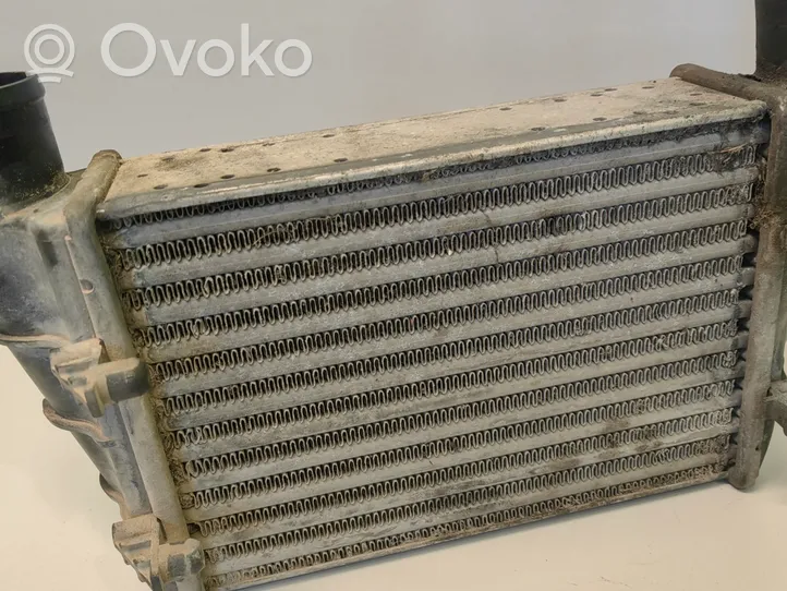 Volkswagen PASSAT B5 Radiador intercooler 058145805A