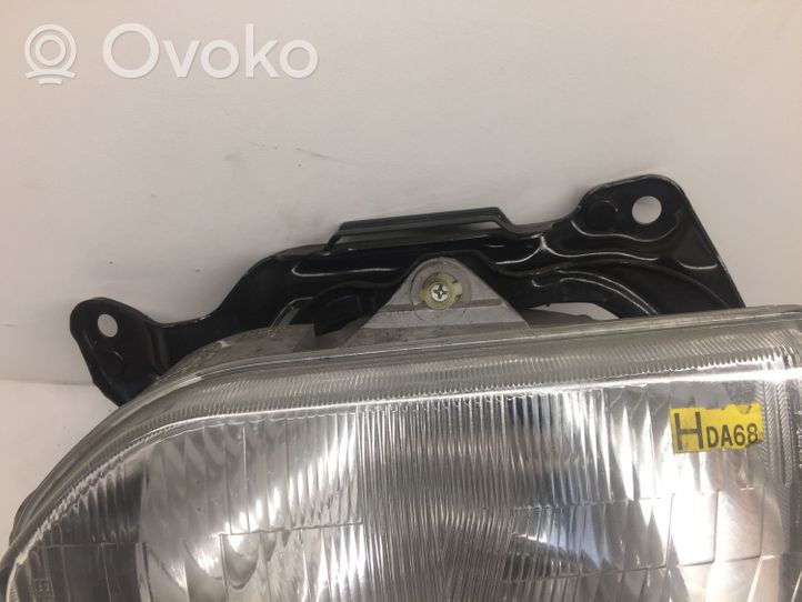 Mazda 121 Faro/fanale 11061238