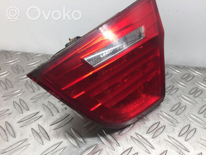 BMW 3 E90 E91 Lampy tylnej klapy bagażnika 7154156