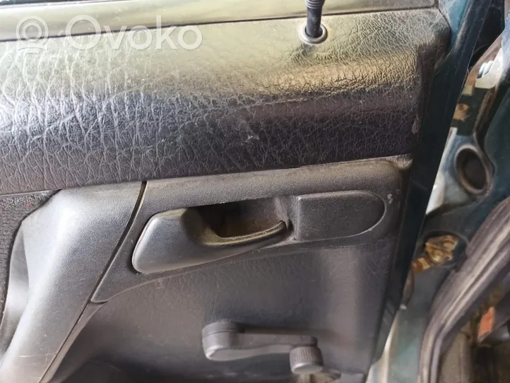 Volkswagen Golf III Rear door interior handle 