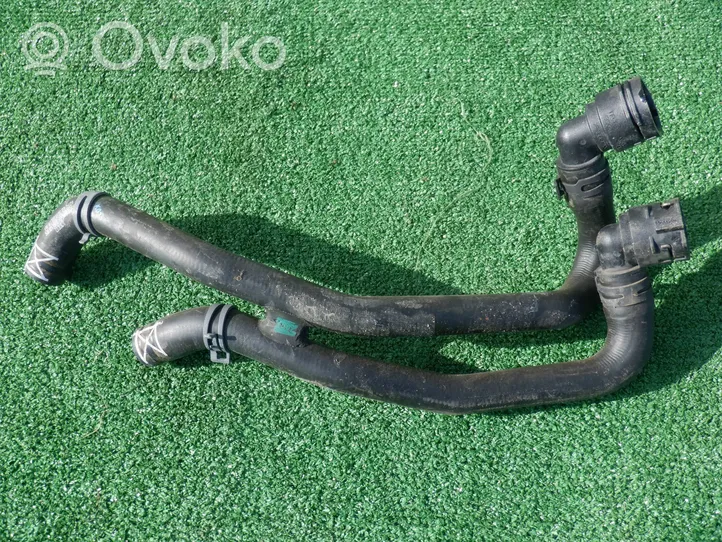 Volkswagen Golf VIII Engine coolant pipe/hose 5Q0121156D